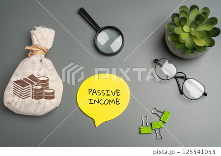 Passive income concept. Type of income that is acquired with little to no labor to earn or maintain. Message and money bag. Business and finance Passive income concept. Type of income that is acquired with little to no labor to earn or maintain. Message and money bag. Business and finance 125541053
