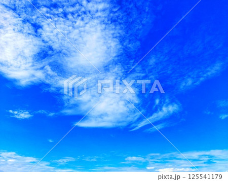 Bright clouds in the sky with a blurred background 125541179