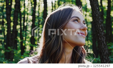 Woman forest sunlight spiritual awakening mindfulness practice nature therapy wellness journey meditation healing energy peaceful moment self discovery positive transformation 125541297