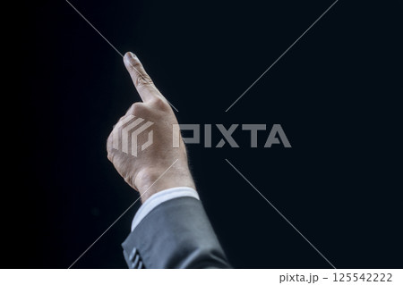 Businessman pointing or touching the blank area with his finger. Copy space. Business concept 125542222