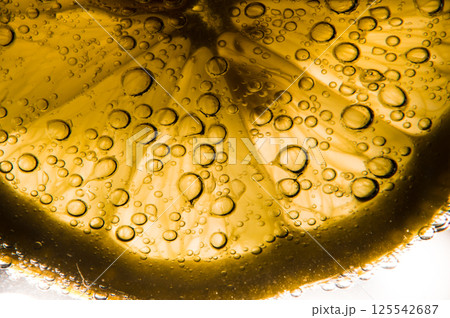 Close-up of a lemon slice. A beautiful slice of lemon. Close-up of a lemon slice. A beautiful slice of lemon. 125542687