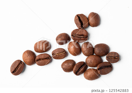 Freshly roasted coffee beans isolated on a white background Freshly roasted coffee beans isolated on a white background 125542883