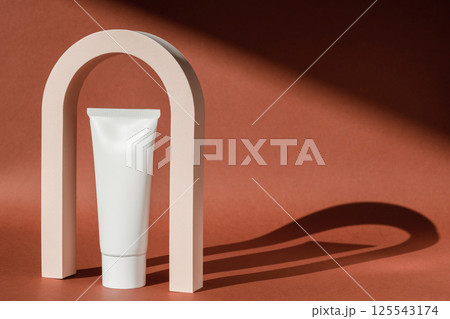 Cream skincare cosmetic art deco arch podium display pedestal stand. Fashion geometric arch for product presentation, lotion, moisturizer. Minimal template. Vintage scene mockup cosmetics 125543174