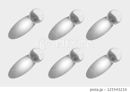 Glass transparent ball with sun reflection, light and shadow, sphere pattern on white background. Orb for fortunetelling and predicting the future Glass transparent ball with sun reflection, light and shadow, sphere pattern on white background. Orb for fortunetelling and predicting the future 125543210