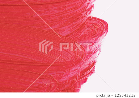 Red cosmetics smear pattern. Beauty product sample closeup. Liquid lipstick cosmetic isolated on white. Swatch matt backdrop. Makeup fashionable creamy texture Red cosmetics smear pattern. Beauty product sample closeup. Liquid lipstick cosmetic isolated on white. Swatch matt backdrop. Makeup fashionable creamy texture 125543218