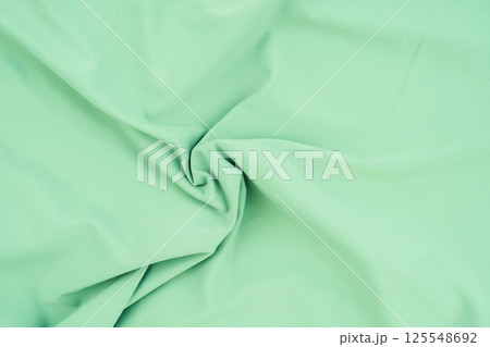 Green fabric with cotton texture, light green for backgrounds, textures, banners. Green fabric with cotton texture, light green for backgrounds, textures, banners. 125548692