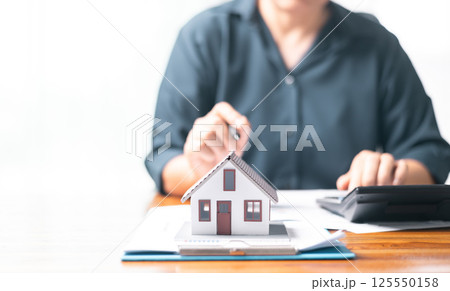 Mortgage loan is crucial part of financing home purchase, often seen as significant investment in real estate, with guidance of skilled agent ensuring sound financial decisions in the housing market. 125550158