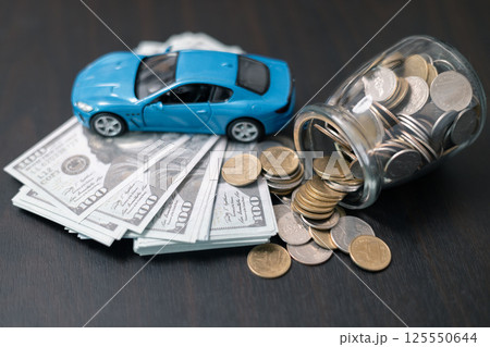 Business concept involved using finance calculator to determine premium for vehicle policy, ensuring clear financial contract for car. Investing in auto insurance can save money on transport costs. Business concept involved using finance calculator to determine premium for vehicle policy, ensuring clear financial contract for car. Investing in auto insurance can save money on transport costs. 125550644