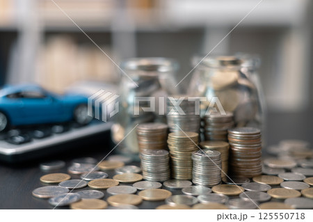 Business concept involved using finance calculator to determine premium for vehicle policy, ensuring clear financial contract for car. Investing in auto insurance can save money on transport costs. 125550718