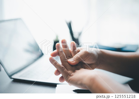 Person experienced pain and inflammation in their wrist, likely due to an injury or arthritis affecting hand and finger muscles, prompting concerns about health. injury, pain, health, finger, wrist. 125551218