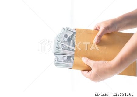 She carefully counted the dollar bills in her hand, managing her business finances and prioritizing saving for future investments. dollar, finance, money, cash, currency, bill, banknote, business. She carefully counted the dollar bills in her hand, managing her business finances and prioritizing saving for future investments. dollar, finance, money, cash, currency, bill, banknote, business. 125551266