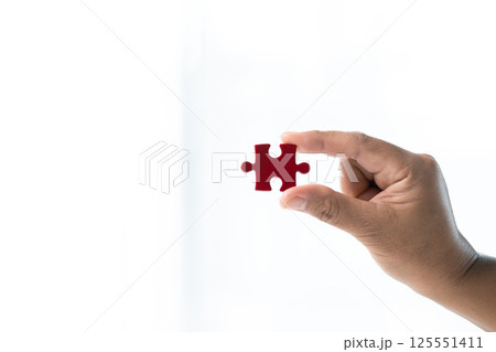 Developing strategic approach to each challenge in business is like piecing together jigsaw puzzle, solution fits into place with careful planning and steady hand, ultimately leading to success. 125551411