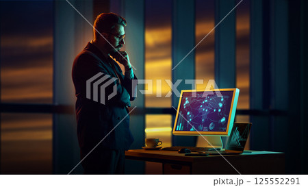 Businessman thinking over global network displayed on screen , symbolizing business collapse, world business connections. Businessman thinking over global network displayed on screen , symbolizing business collapse, world business connections. 125552291