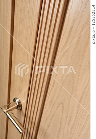 Closed wooden door Closed wooden door 125552314
