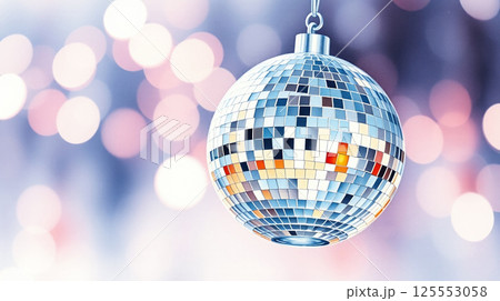 shiny disco ball hanging against a blurred background with soft pink and blue bokeh lights shiny disco ball hanging against a blurred background with soft pink and blue bokeh lights 125553058