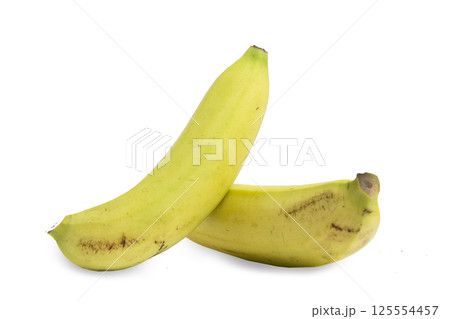pair of yellowish green bananas isolated on white, bananas with natural spot skin 125554457