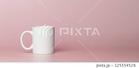 white cup for tea or coffee on a pink background white cup for tea or coffee on a pink background 125554529
