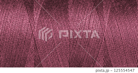 Red sewing thread texture Red sewing thread texture 125554547