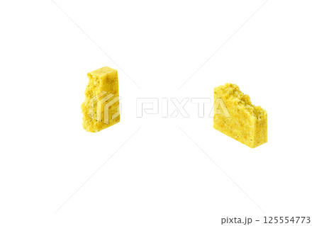 two halves bouillon cube isolated on a white background. two halves bouillon cube isolated on a white background. 125554773