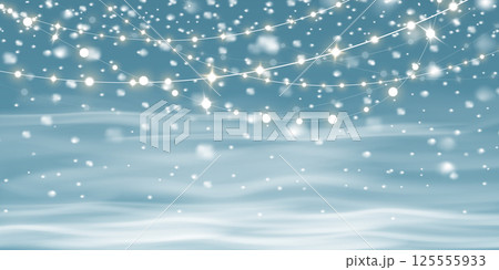 A beautiful Winter Wonderland featuring Sparkling Snow against a Soft Blue Background, creating a serene atmosphere 125555933