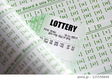 Green lottery tickets and blank bills with numbers for playing lottery Green lottery tickets and blank bills with numbers for playing lottery 125556694