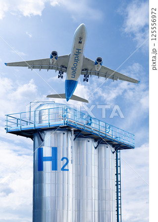 Airplane and green hydrogen gas tank 125556972