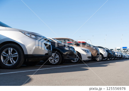 A lot of cars in a rows. Used car sales A lot of cars in a rows. Used car sales 125556976