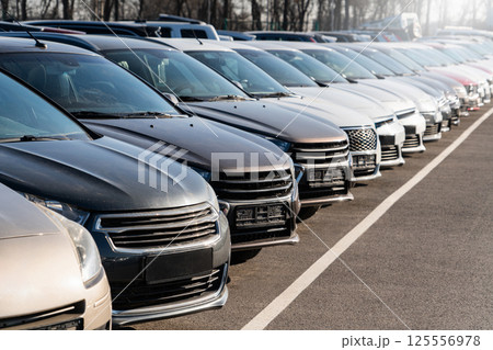 A lot of cars in a rows. Used car sales A lot of cars in a rows. Used car sales 125556978