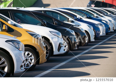 A lot of cars in a rows. Used car sales A lot of cars in a rows. Used car sales 125557010