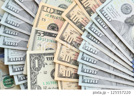 American US dollars money bills close up in big amount American US dollars money bills close up in big amount 125557220