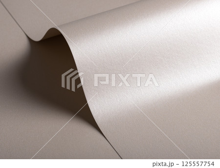 Paper background with satin pearlescent texture. Glossy folded curves, soft wave and sculptural flow Paper background with satin pearlescent texture. Glossy folded curves, soft wave and sculptural flow 125557754