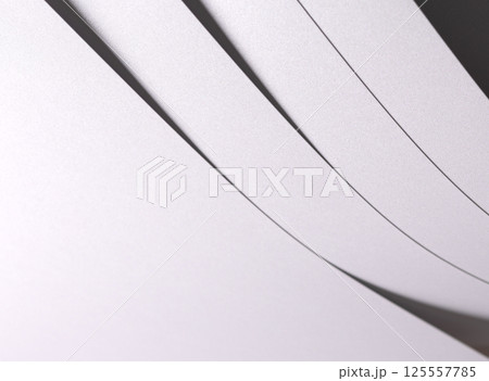 White pearl paper background with a glossy satin texture and layered strips. Pale grey and icy White pearl paper background with a glossy satin texture and layered strips. Pale grey and icy 125557785