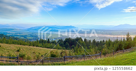 Summer misty mountain village. 125558662