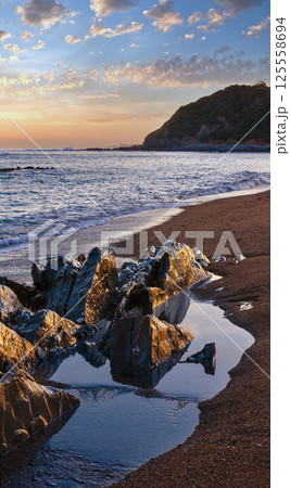 Sunrise ocean view from beach (Bay of Biscay). Sunrise ocean view from beach (Bay of Biscay). 125558694