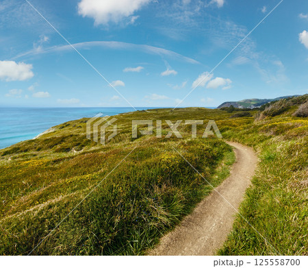 Summer ocean coastline view near Gorliz town (Spain). Summer ocean coastline view near Gorliz town (Spain). 125558700