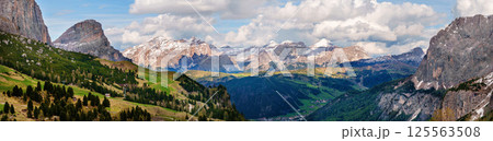 Majestic mountain landscape with scenic valley and snow-capped peaks near Valley of Funes at Dolomites, Italy 125563508