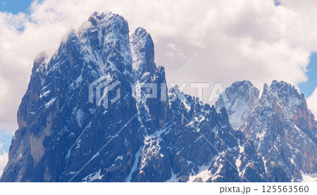 Majestic snowy mountain peaks near Valley of Funes at Dolomites, Italy 125563560