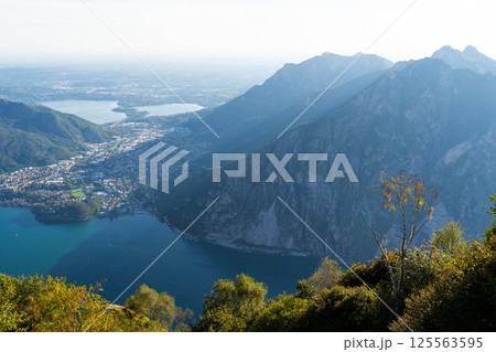 Panoramic view of lakes and surrounding mountains near town of Lecco Panoramic view of lakes and surrounding mountains near town of Lecco 125563595