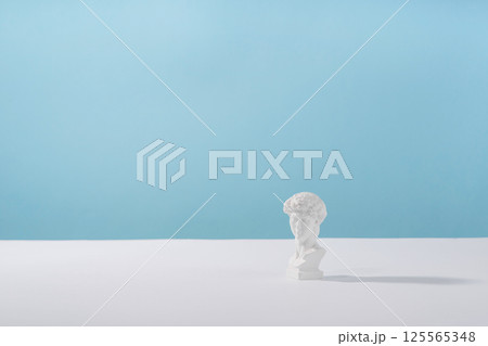 Cosmetic display podium platform greek man with roman marble column for product presentation, cosmetics geometric stand stylish props, mockup scene aesthetic on blue. Creative product stage .. Cosmetic display podium platform greek man with roman marble column for product presentation, cosmetics geometric stand stylish props, mockup scene aesthetic on blue. Creative product stage .. 125565348