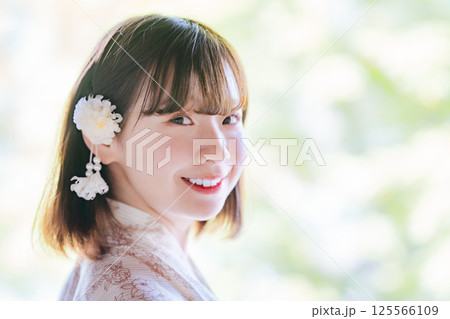 浴衣を着た若い女性の横顔 浴衣を着た若い女性の横顔 125566109