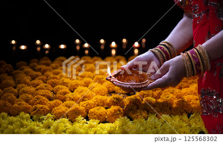 Diwali Traditions and Celebrations Around the World. 125568302