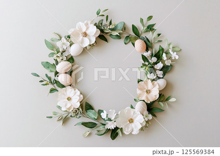 Delicate watercolor strokes form a pastel floral wreath, hiding charming Easter eggs within 125569384