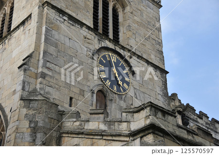 Clock outside York Cathedral, Yorkshire, England Clock outside York Cathedral, Yorkshire, England 125570597