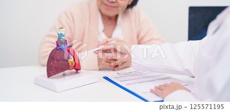 Doctor with Respiratory system. Elderly Patient consultation medical health for Lung Cancer, Asthma, Chronic Obstructive Pulmonary, Bronchitis, Emphysema, Cystic Fibrosis, Bronchiectasis, Pneumonia Doctor with Respiratory system. Elderly Patient consultation medical health for Lung Cancer, Asthma, Chronic Obstructive Pulmonary, Bronchitis, Emphysema, Cystic Fibrosis, Bronchiectasis, Pneumonia 125571195