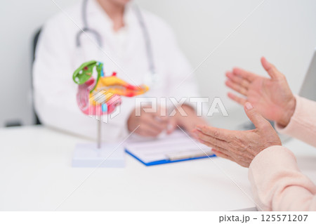 Elderly Patient consultation with doctor for Pancreas, Gallbladder, Bile Duct, Duodenum, Small intestine. Pancreatic cancer, Acute and Chronic pancreatitis, Digestive system and medical healthcare 125571207