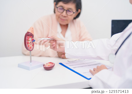 Elderly Patient consultation with doctor for Kidney disease, Urinary system and Stones, Cancer, world kidney day, Chronic kidney, Urology, Nephritis, Renal, Transplant and medical healthcare concept Elderly Patient consultation with doctor for Kidney disease, Urinary system and Stones, Cancer, world kidney day, Chronic kidney, Urology, Nephritis, Renal, Transplant and medical healthcare concept 125571413