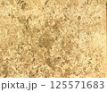 Rough gold textured background with natural cracks and scratches. Ideal for luxury designs, vintage projects, packaging, branding, invitation 125571683