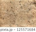 Rough gold textured background with natural cracks and scratches. Ideal for luxury designs, vintage projects, packaging, branding, invitation 125571684