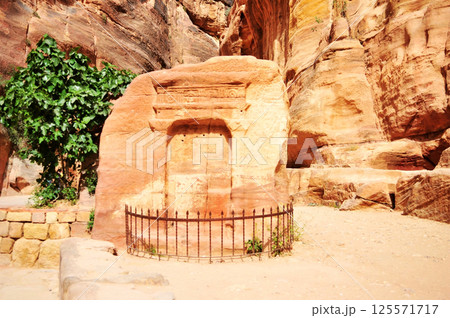 Ancient carvings on rocks in Petra, Jordan. 125571717