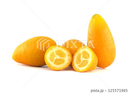 Close-Up of Fresh Kumquats Sliced to Reveal Juicy Inner Flesh 125571985